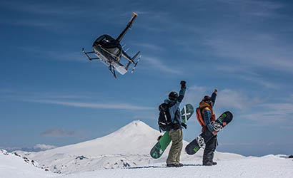 trilling heli snowboarding